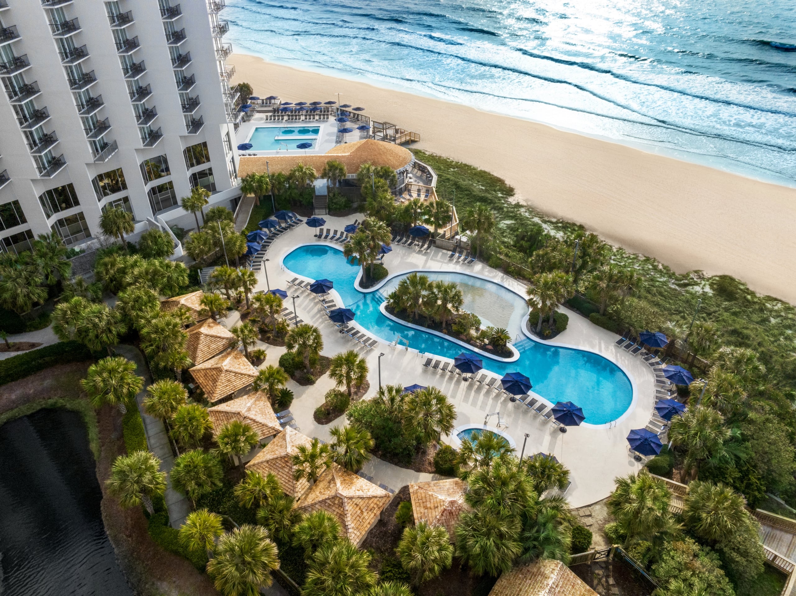 Aeriel of the sand bottom pool at Hilton