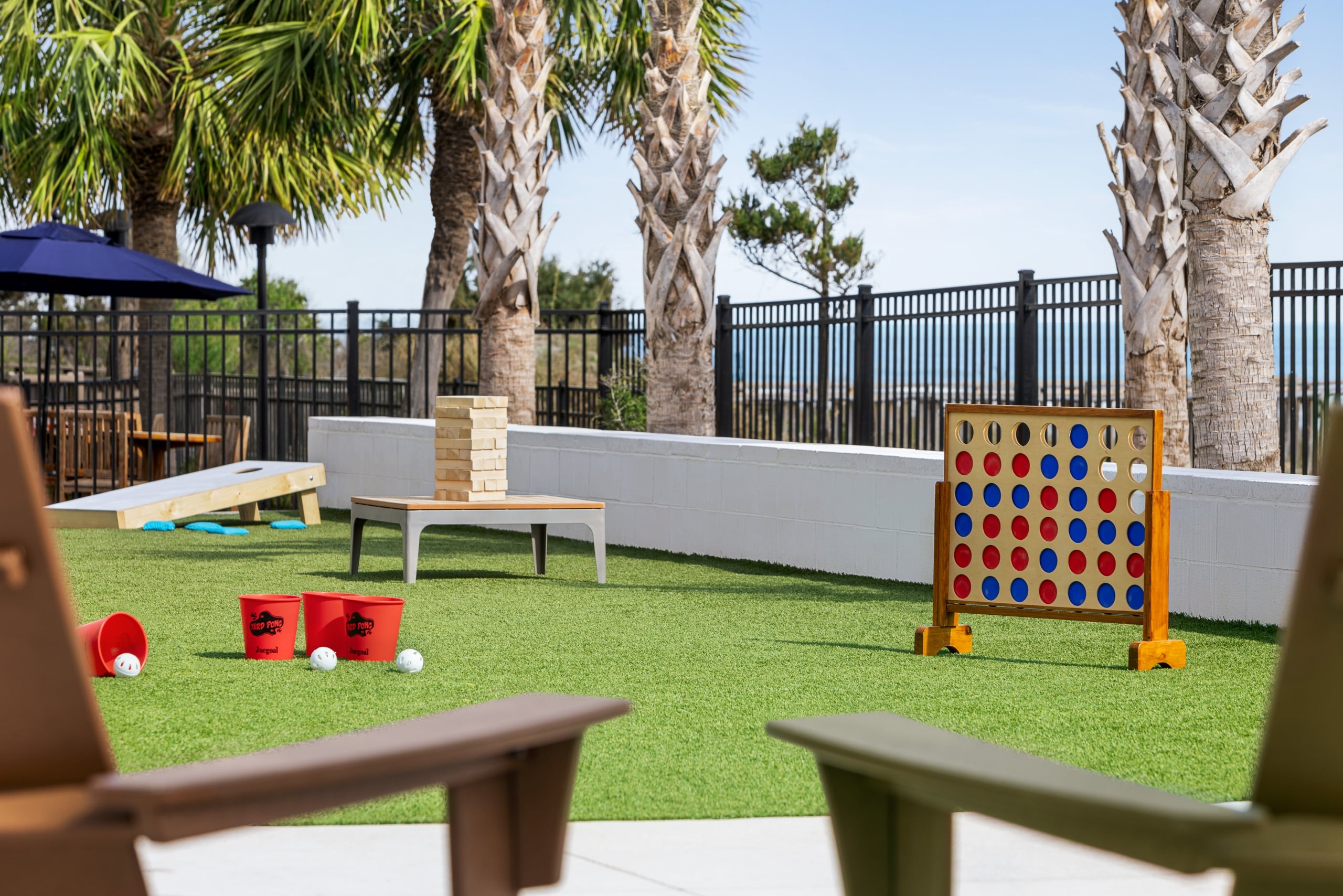 Currents Seaside Entertainment activity lawn with Giant Jenga, Giant Connect 4, Cornhole, and other games for the family
