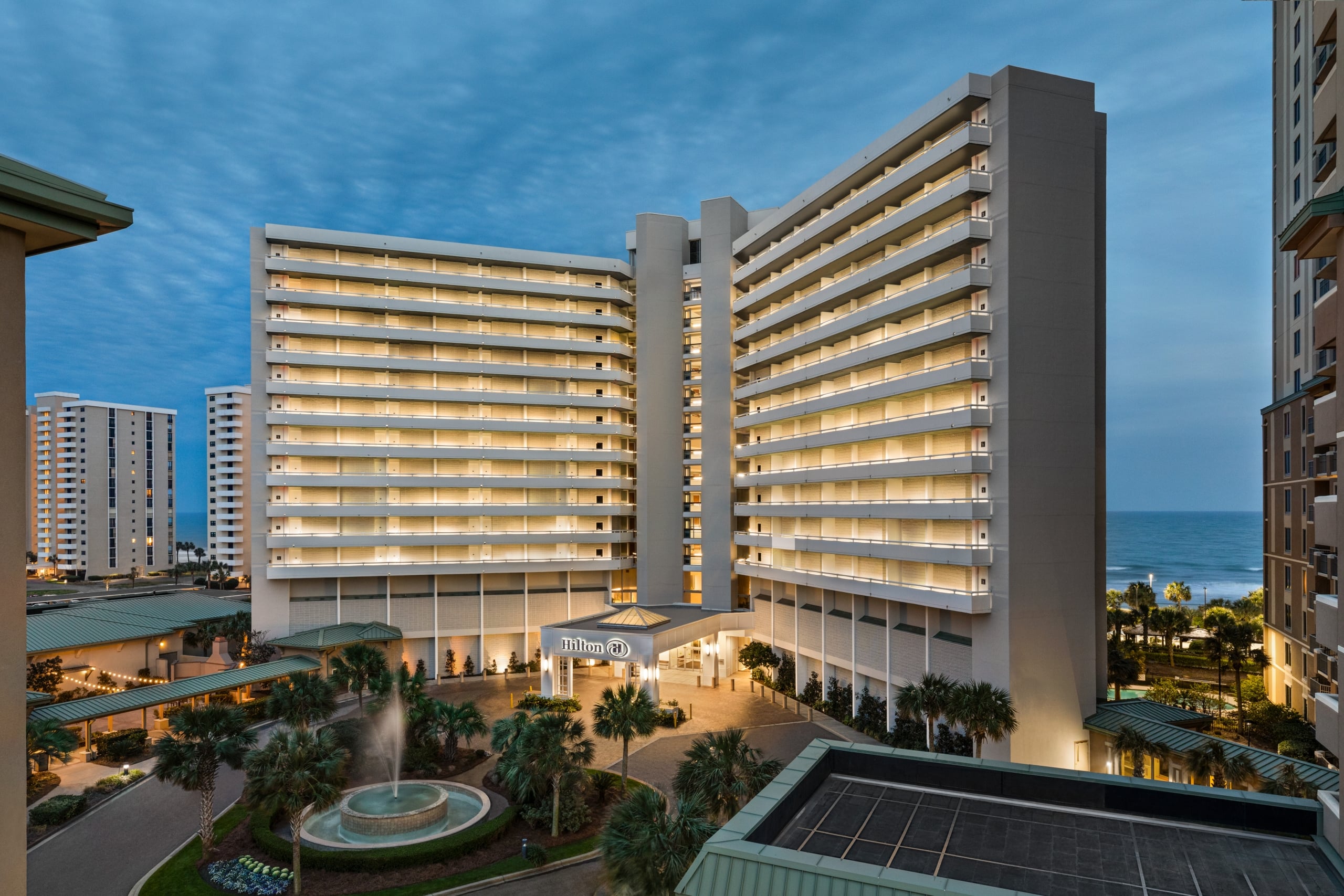 Hilton front entrance exterior at night
